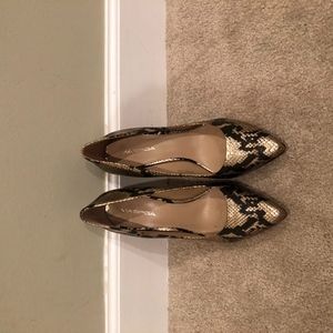 black and gold snake print heels